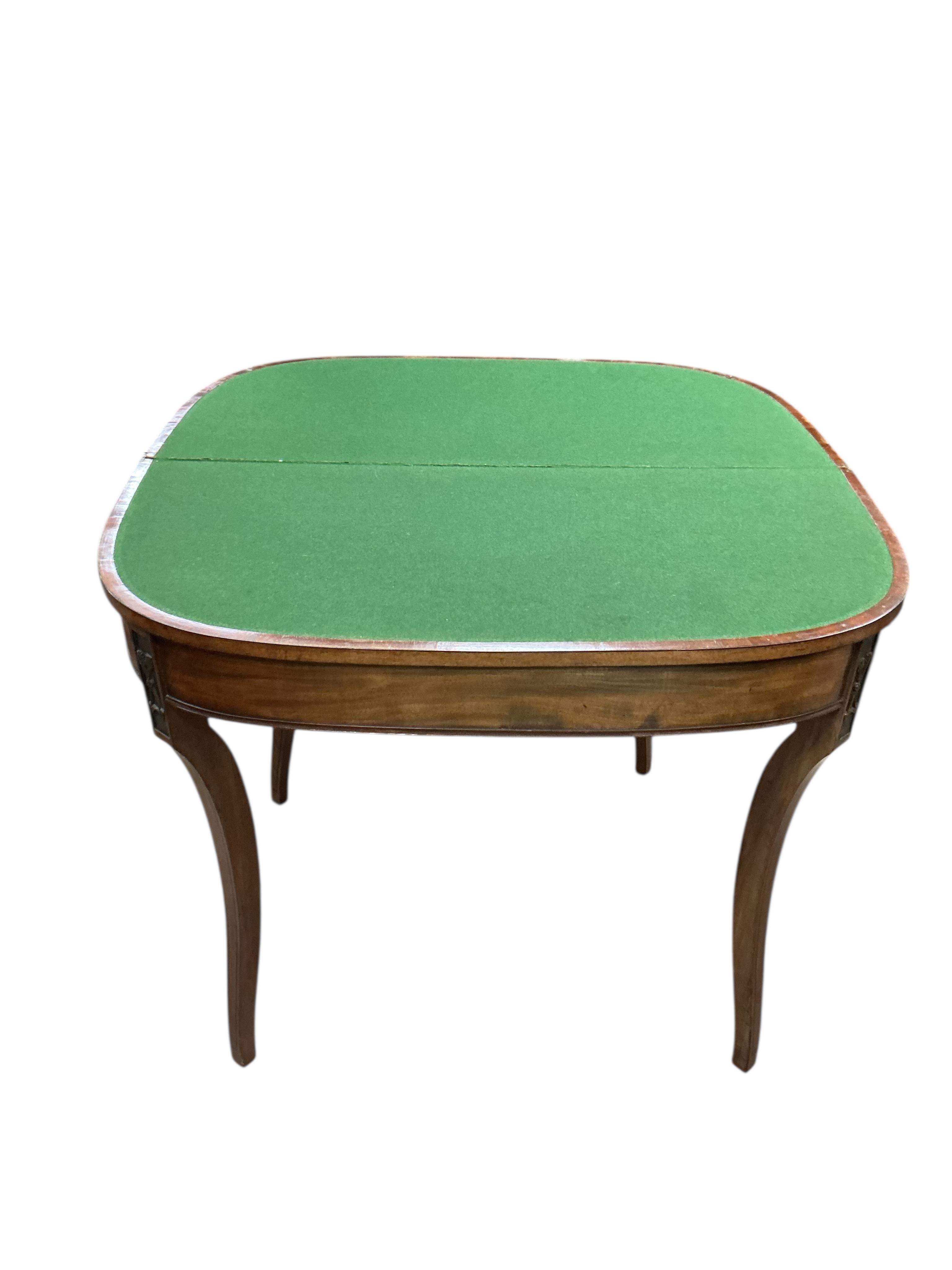 A Regency mahogany D shaped folding card table, width 92cm, depth 45cm, height 74cm